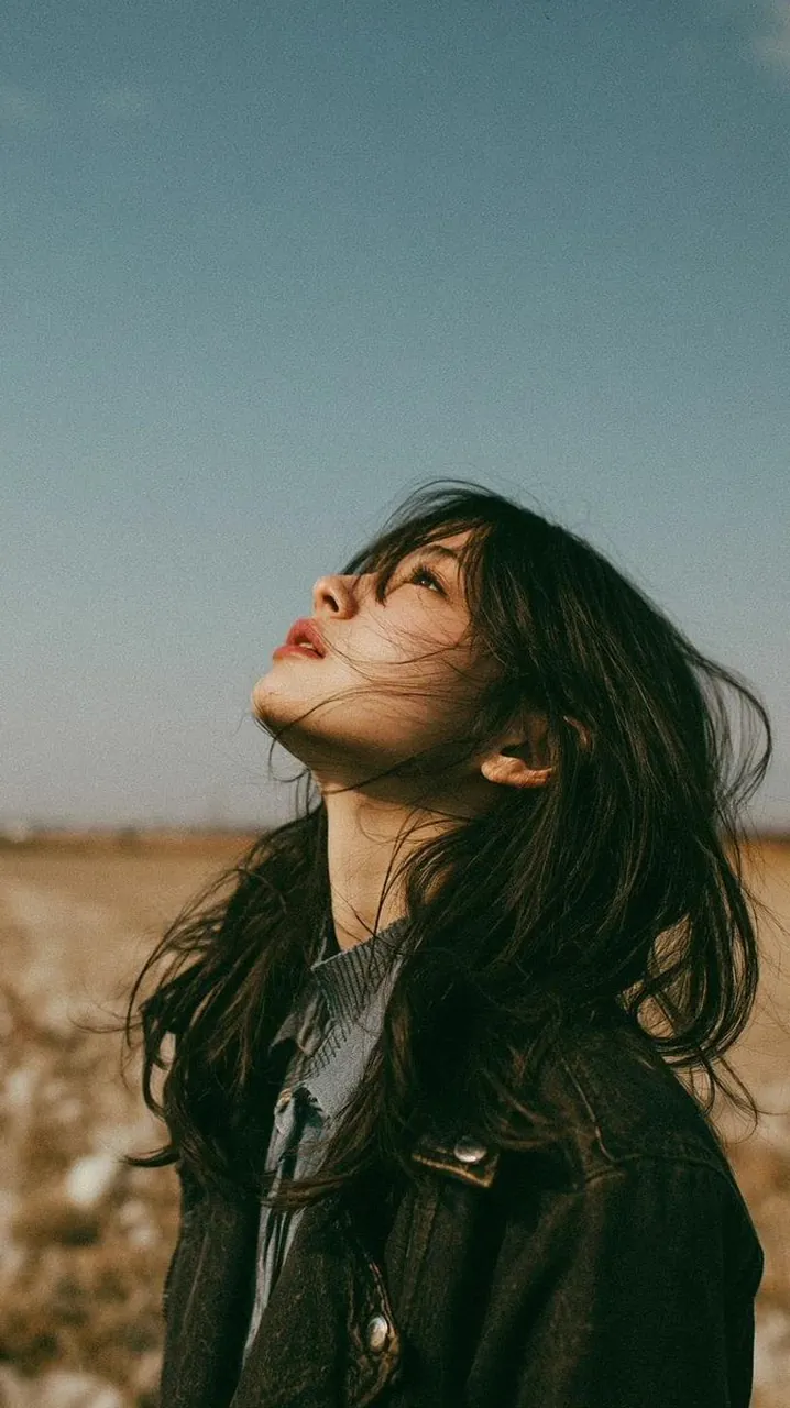 Cinematic minimalist portrait of a beautiful young East Asian