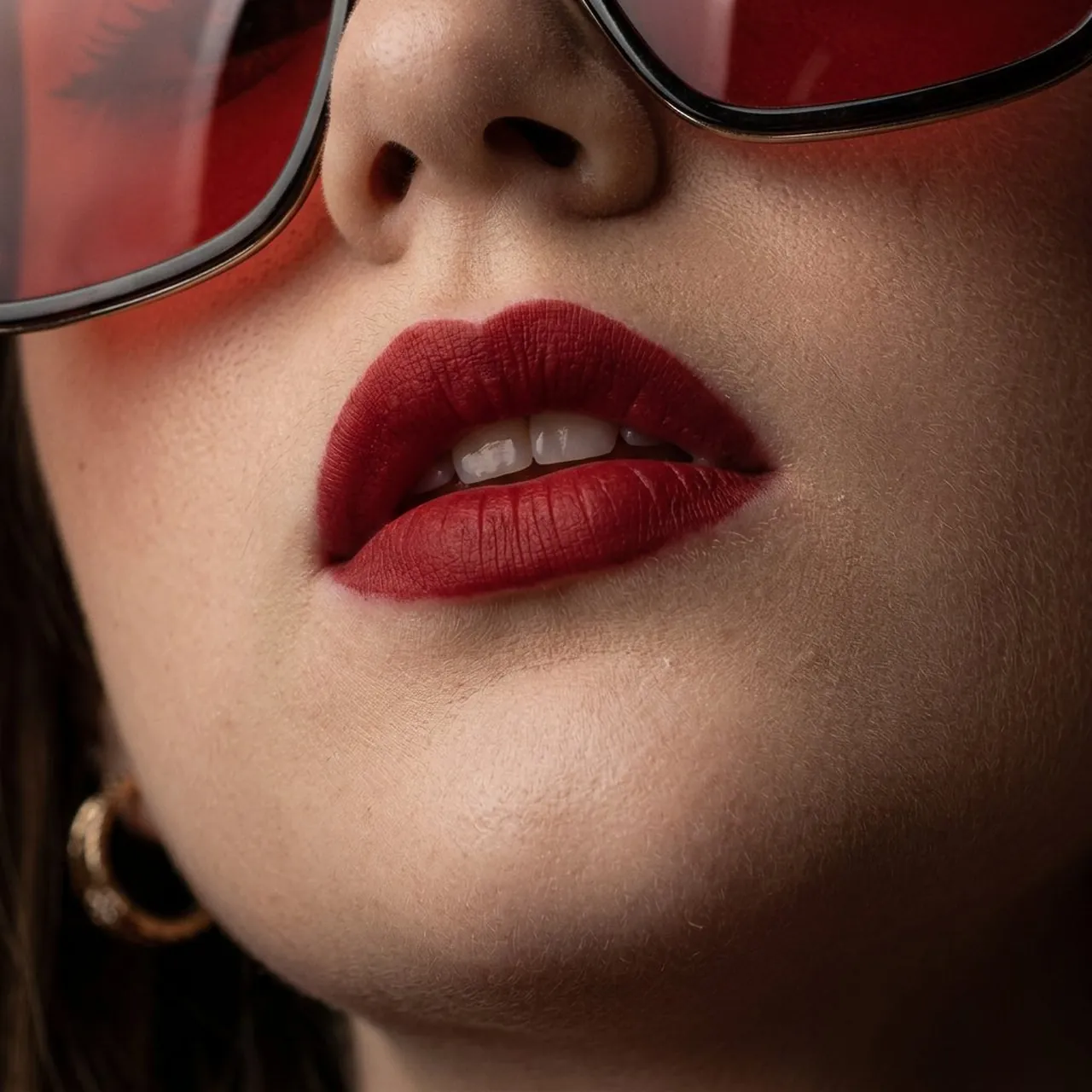 High-fashion beauty portrait of young woman with sleek