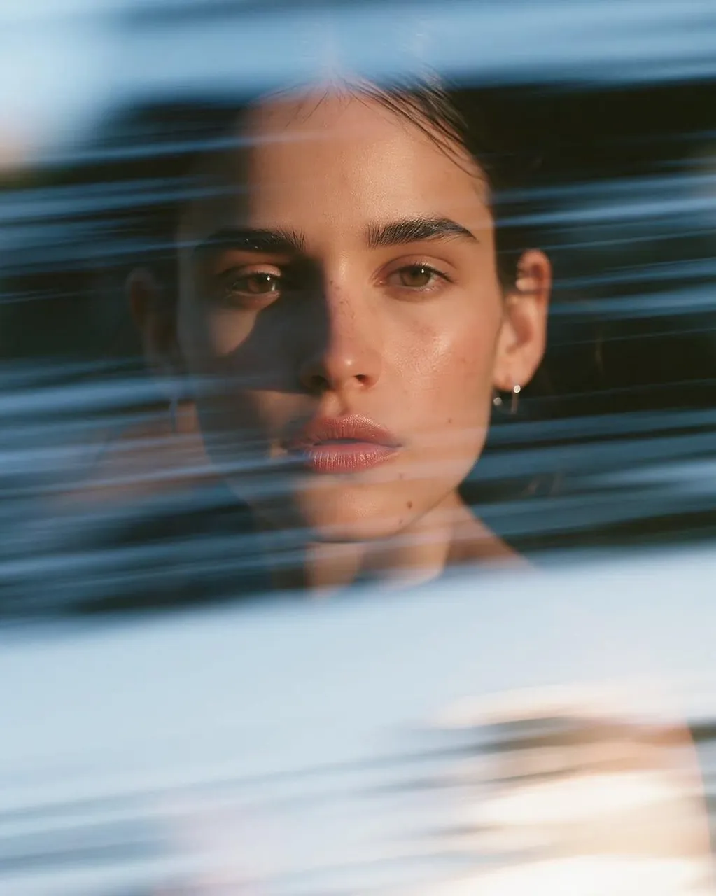 Ultra-realistic cinematic close-up portrait of a beautiful young