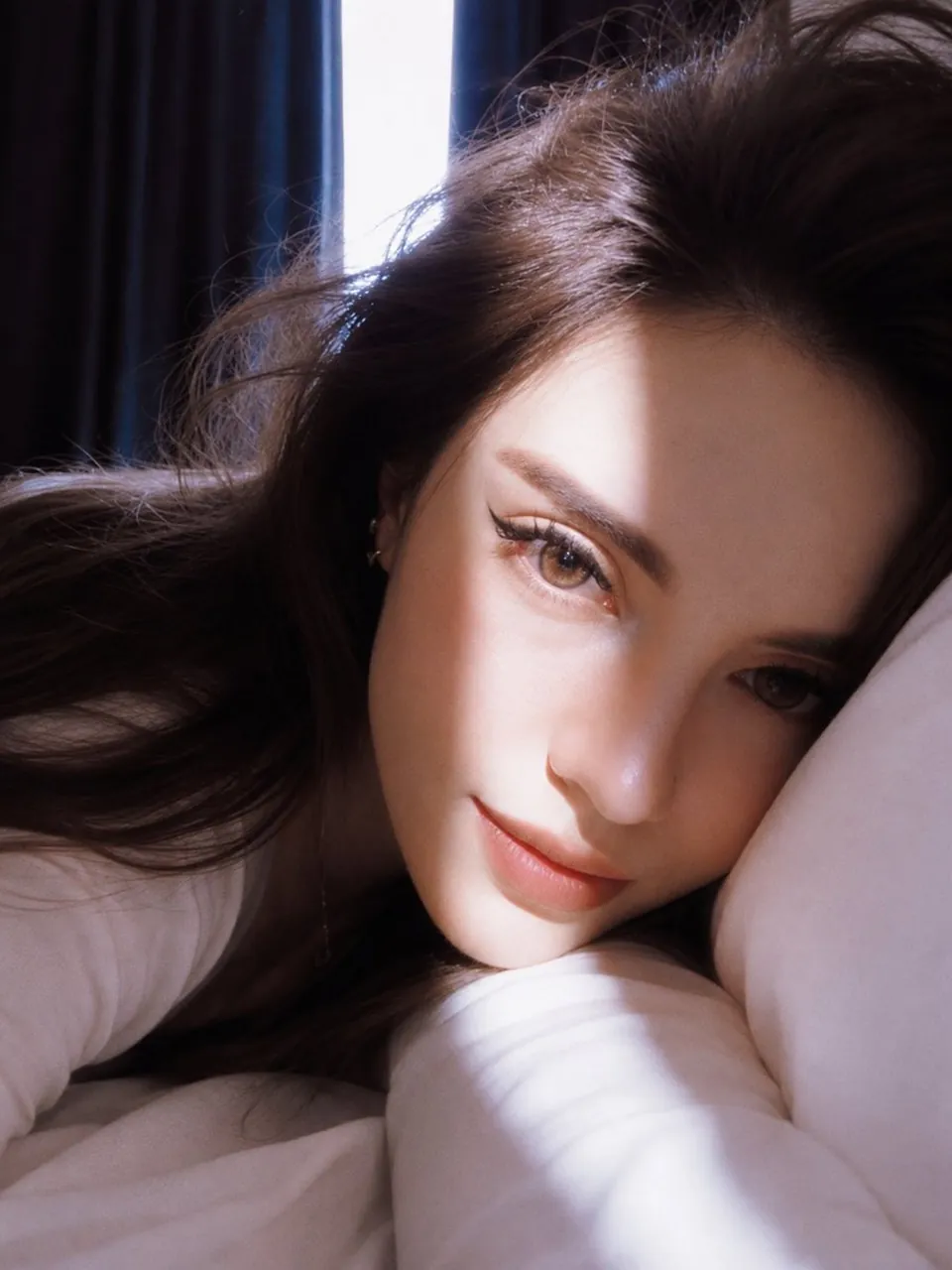An ultra-realistic, close-up portrait of a stunning young woman