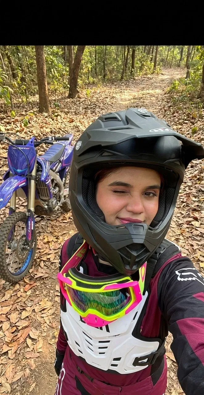 Just a girl, her dirt bike, and a whole forest to conquer.